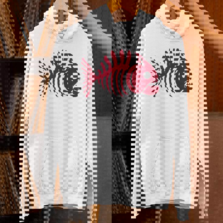 ピラニアスケルトン。魚の頭蓋骨と骨の様式化されたデザイン。 パーカー