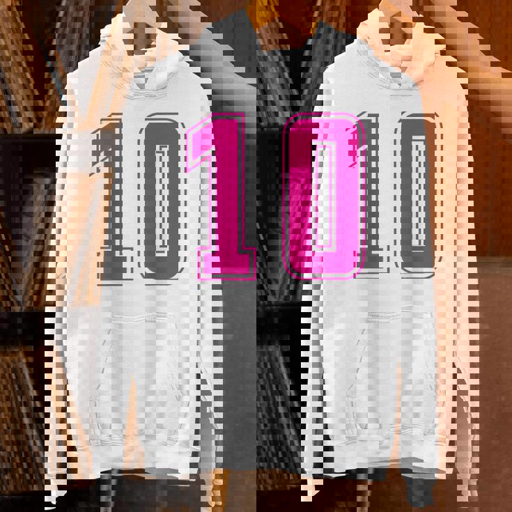 ピンク色背番号 10 チーム短大スポーツピンク色背番号付きユニフォーム パーカー