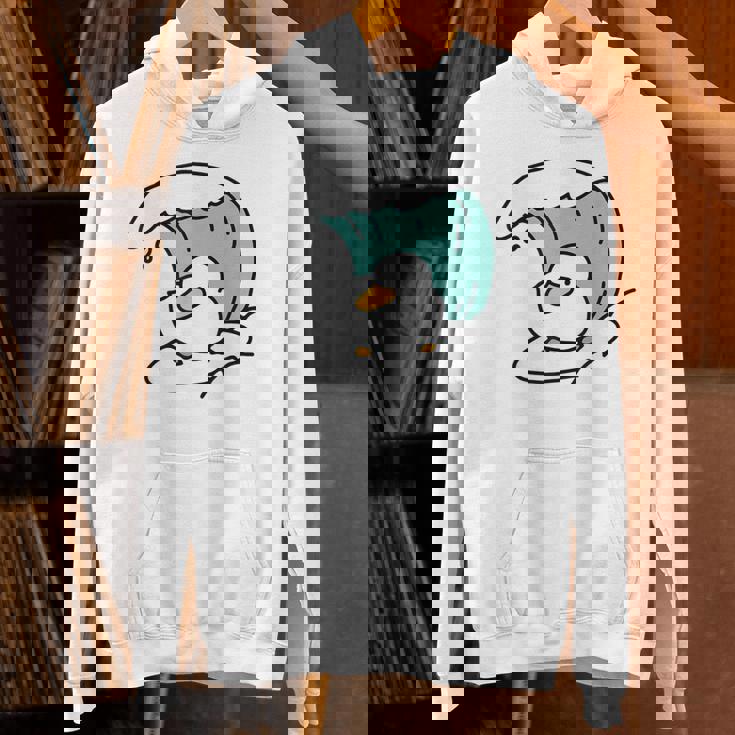 面白くてかわいい小さなアヒルが波をキャッチ。 パーカー