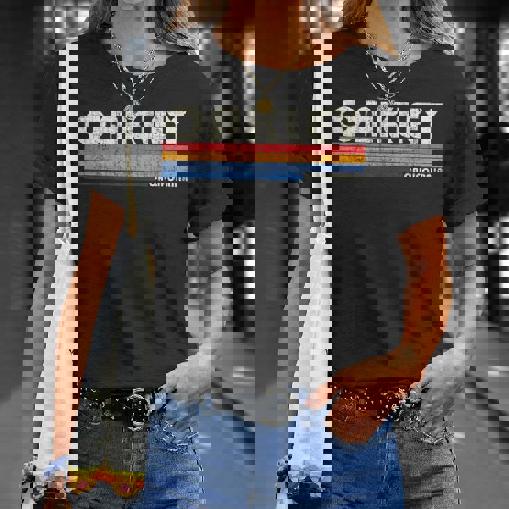 ヴィンテージ70年代80年代スタイルoakley Ca Tシャツ 彼女への贈り物