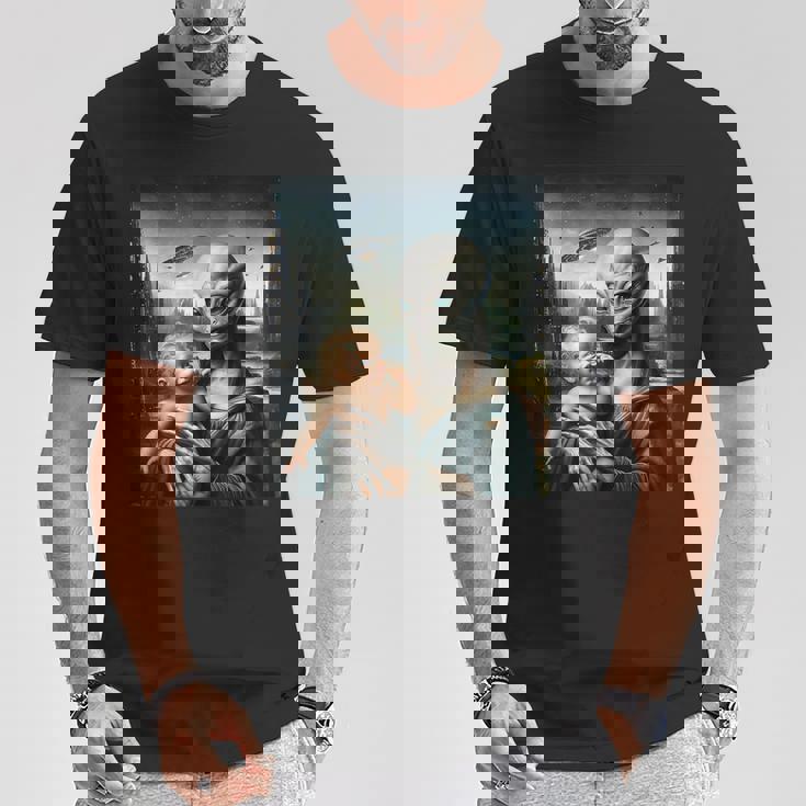 エイリアンホールディングヒューマンベイビーufo地球外接触tシャツ Tシャツ 面白い贈り物