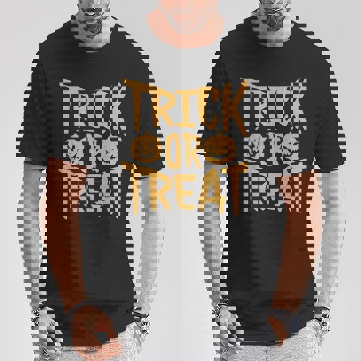 トリックオアトリートパンプキンフェイスハロウィングラフィック。 Tシャツ 面白い贈り物