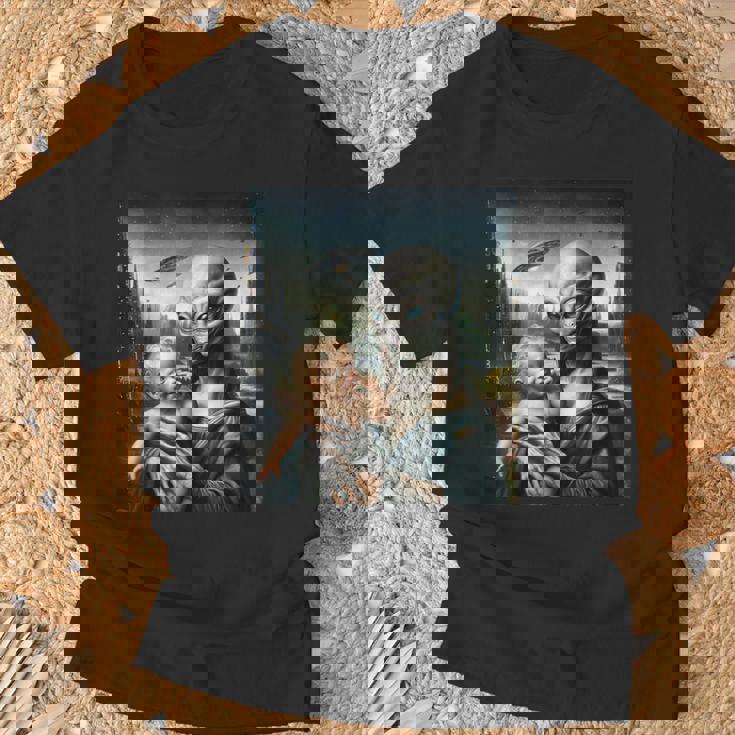 エイリアンホールディングヒューマンベイビーufo地球外接触tシャツ Tシャツ 高齢者への贈り物