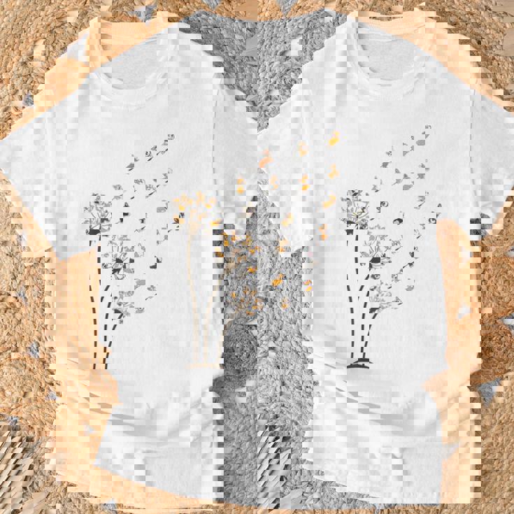 コーギー フラワー フライ タンポポ 面白い かわいい 犬好き ウェルシュ コーギー Tシャツ 高齢者への贈り物