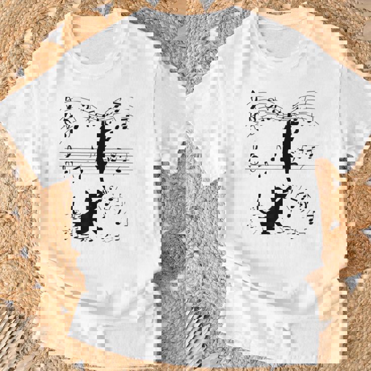 楽譜で遊ぶ面白い猫 Tシャツ 高齢者への贈り物