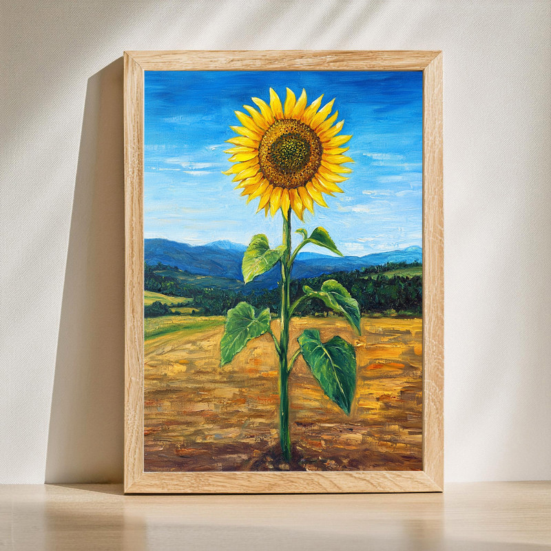 Single sunflower in a field canvas wall art, bright yellow bloom over green meadow, landscape orientation for living room | Family Wall Decor