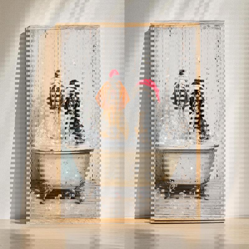 Christmas Blenheim Cavalier and Bloodhound in a bathtub canvas wall art, festive holiday bathroom decor for dog lovers