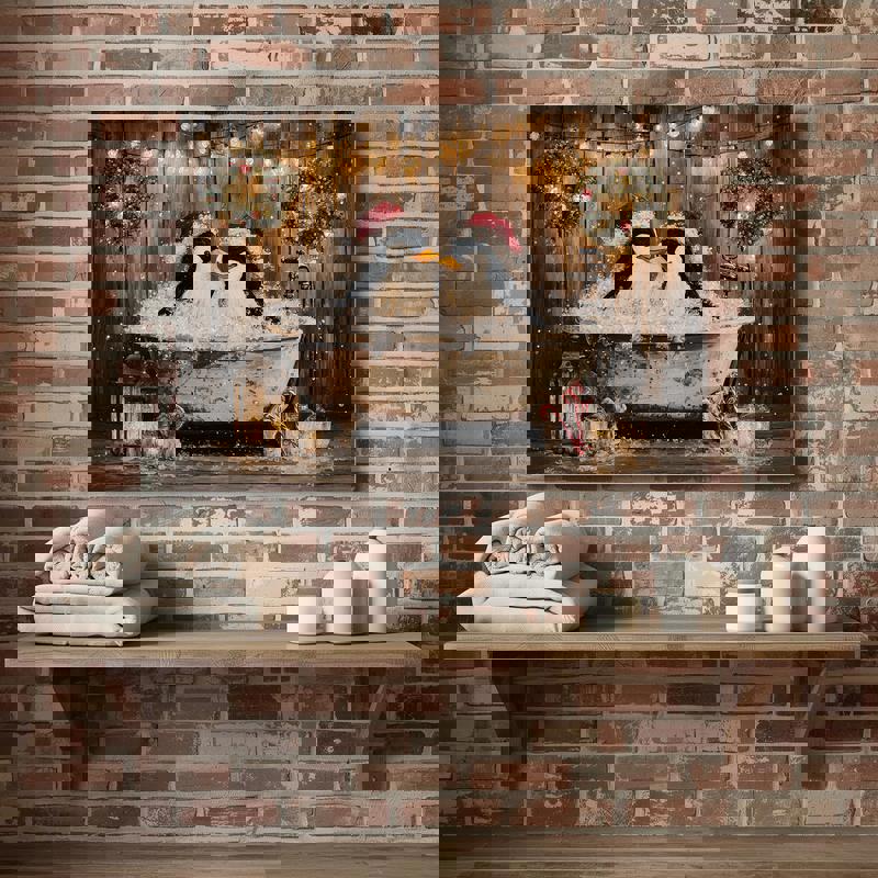 Couple penguins in Christmas bathtub canvas wall art, red and green palette brightens seasonal bathroom decor with playful snowflake details