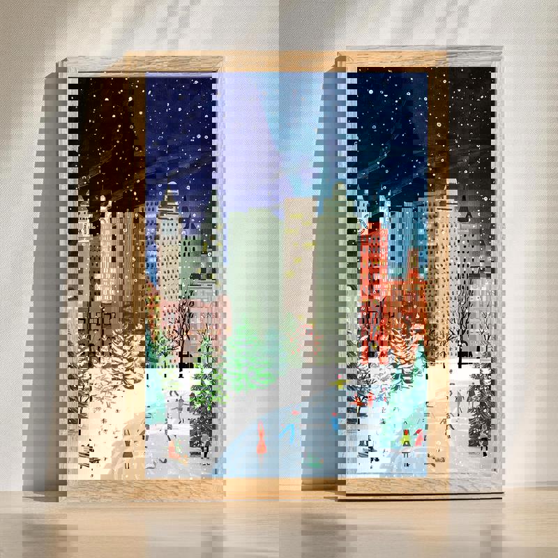 Christmas in the City canvas wall art with festive urban skyline, lights and snow for cozy bedroom Christmas decor | Familywalldecor