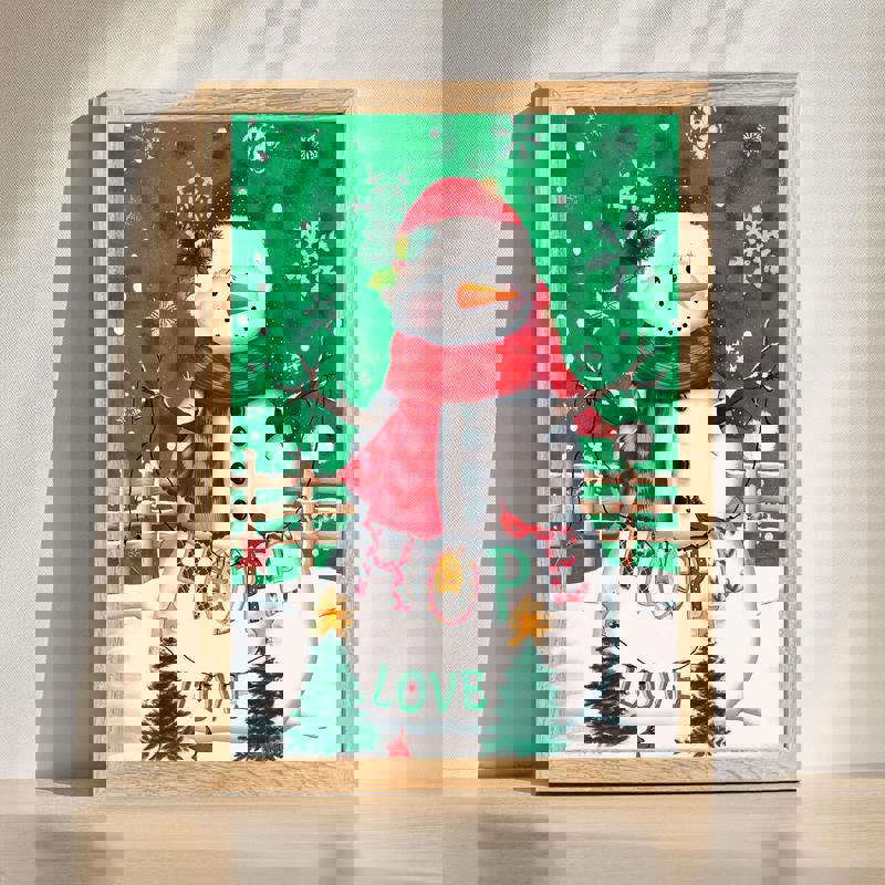 Merry snowman canvas for bedroom Christmas decor, featuring a smiling snowman with red scarf, snowflakes, and pine accents. | Familywalldecor