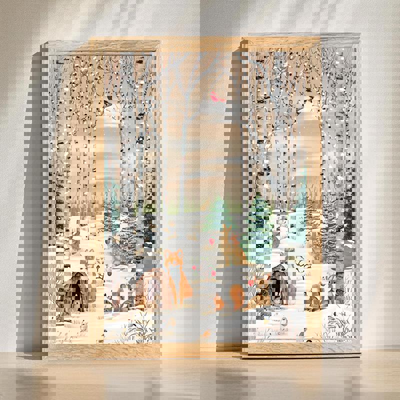 Woodland winter scene canvas wall art with snowy pines and cozy Christmas glow, perfect for bedroom holiday decor | Familywalldecor