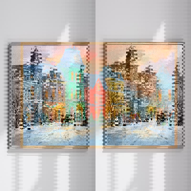 Victorian Christmas Town canvas wall art, cozy winter scene with red, green, and yellow lights, snow, and storefronts | Familywalldecor