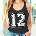 12番の前面と背面にホワイトのプリント。 タンクトップ