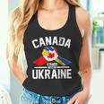 カナダはウクライナのウクライナのカナダの旗のtシャツで立ちます タンクトップ