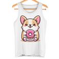 かわいいコーギーのドーナツを持つ漫画の犬愛好家アートキッズ。 タンクトップ