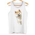かわいい日本の秋田犬が角をのぞく犬好き。 タンクトップ