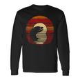 ウツボ サンセット レトロスタイル サファリ ヴィンテージ 70年代 釣り 長袖Tシャツ ギフトのアイデア