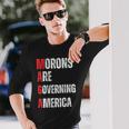 モロンはアメリカを支配している政治的ユーモアの自由のスピーチ 長袖Tシャツ 彼への贈り物