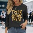 トリックオアトリートパンプキンフェイスハロウィングラフィック。 長袖Tシャツ 彼女への贈り物