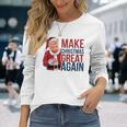 面白いクリスマスグレートアゲイントランプサンタファンusaホリデー 2024 長袖Tシャツ 彼女への贈り物