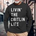 Caitlin の人生を生きている Caitlin 長袖Tシャツ 高齢者への贈り物