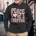平和の愛と倹約心と平和のシンボル。 長袖Tシャツ 高齢者への贈り物