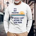 地元の人々がここに住む余裕がないなら、それは楽園ではない 長袖Tシャツ 高齢者への贈り物
