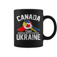 カナダはウクライナのウクライナのカナダの旗のtシャツで立ちます コーヒーマグ