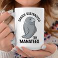 マナティーに気を取られる かわいい 海の動物 マナティー コーヒーマグ 面白い贈り物