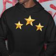 3つの黄金の星 パーカー 面白い贈り物
