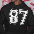87番の前面と背面にホワイトのプリント。 パーカー 面白い贈り物