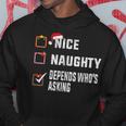 Nice Naughty Depends Who's Asking クリスマスリスト サンタ クリスマス パーカー 面白い贈り物
