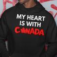 「My Heart Is With Canada」 – カナダ人と強く立つ パーカー 面白い贈り物