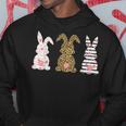 かわいい ヒョウ イースター バニー ウサギ トリオ フローラル ハッピーイースター パーカー 面白い贈り物