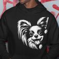 かわいい覗くパピヨン犬のグラフィック デザイン パーカー 面白い贈り物