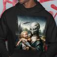 エイリアンホールディングヒューマンベイビーufo地球外接触tシャツ パーカー 面白い贈り物