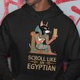エジプトの猫のようなスクロールデザイン。 パーカー 面白い贈り物