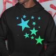 カラフルなグリーンブルーの星、星柄デザイン。 パーカー 面白い贈り物