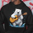 クマがアコースティックギターを弾くクマのギタリスト パーカー 面白い贈り物
