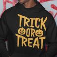 トリックオアトリートパンプキンフェイスハロウィングラフィック。 パーカー 面白い贈り物