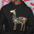 ラマ アルパカ フローラル カラフル 花 ペルーのお土産 パーカー 面白い贈り物