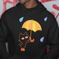 大人かわいい絵本の猫 雨の日 パーカー 面白い贈り物
