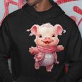 帽子とスカーフを着た豚のクリスマスプレゼント パーカー 面白い贈り物