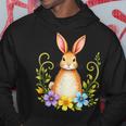 花と葉を持つ愛らしいウサギ 自然デザイン パーカー 面白い贈り物