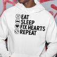 Eatleep Fix Heartsリピート心臓専門医心臓病学 パーカー 面白い贈り物