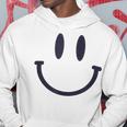 スマイリーフェイス キュート ポジティブ モチベーションアップ ハッピーススマイルフェイス パーカー 面白い贈り物
