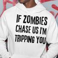 ゾンビに追われたらつまずくよおもしろいハロウィン パーカー 面白い贈り物