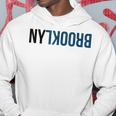 ニューヨークのファンのためのニューヨークブルックリンクリエイティブフリップデザイン パーカー 面白い贈り物