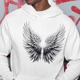 背中には白い天使の羽 パーカー 面白い贈り物