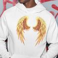 背中には金色の天使の羽 パーカー 面白い贈り物